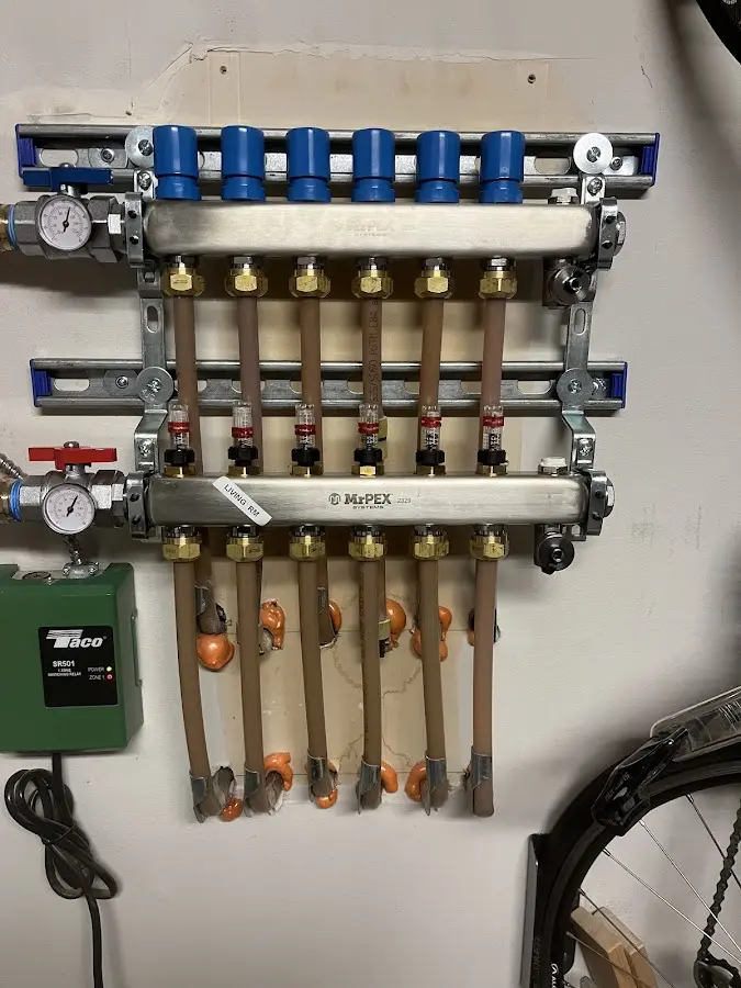 Plumber performing Gas Leak Detection at a residential property in Maryland City